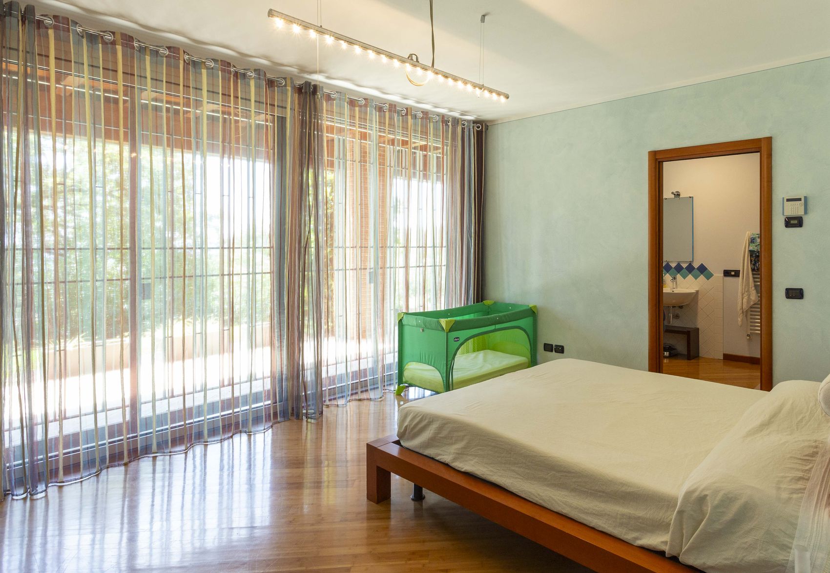 The master bedroom with sliding doors onto the garden