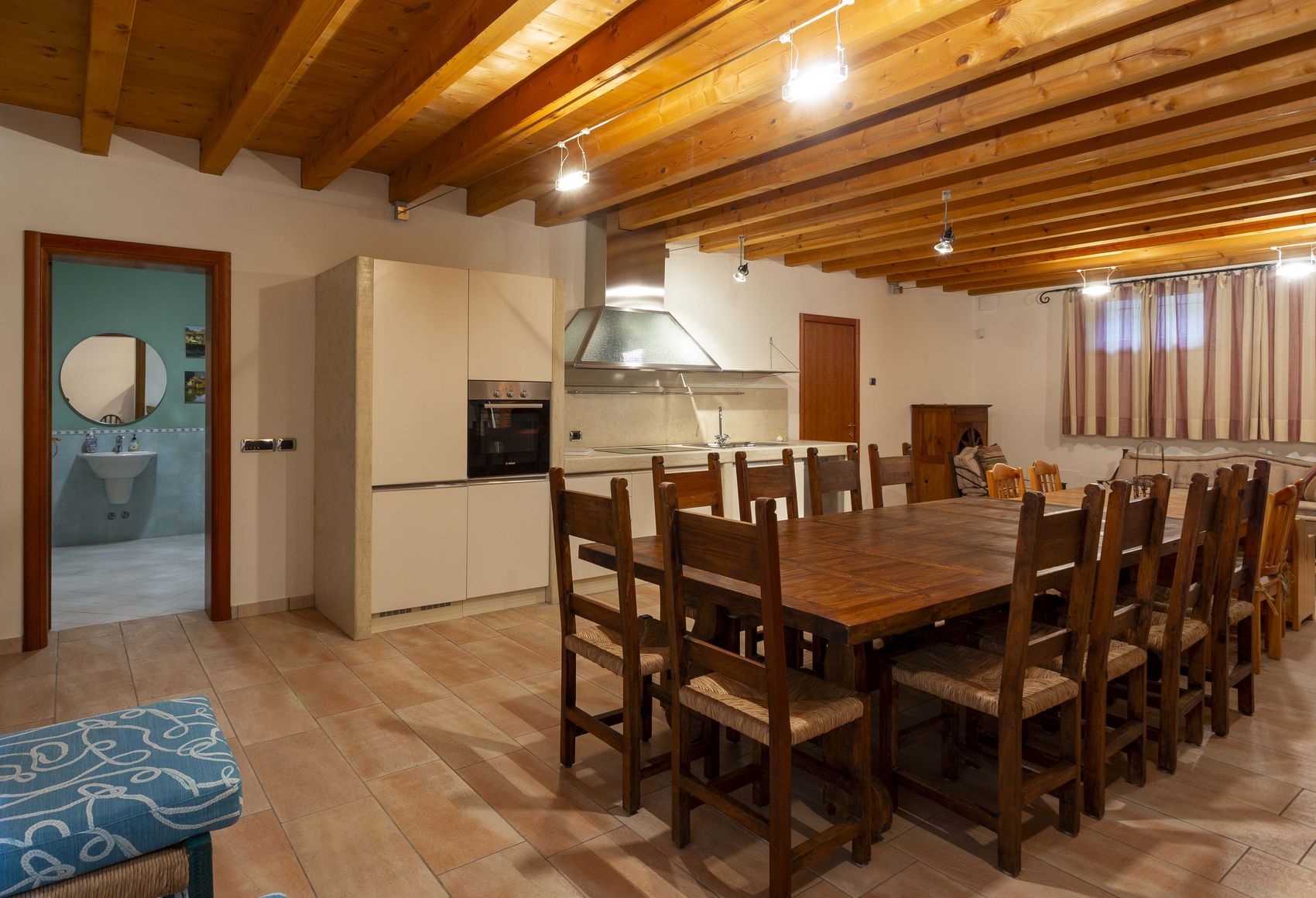 The taverna table set for a large group